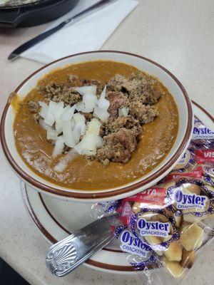 Bowl of chili with loose burger