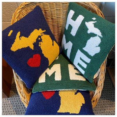 Hooked pillows salute Michigan.