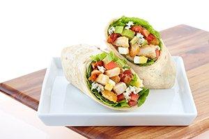 COBB WRAP: Chopped romaine & iceberg blend, breaded chicken, crispy bacon, tomatoes, avocado, chopped eggs, & bleu cheese.