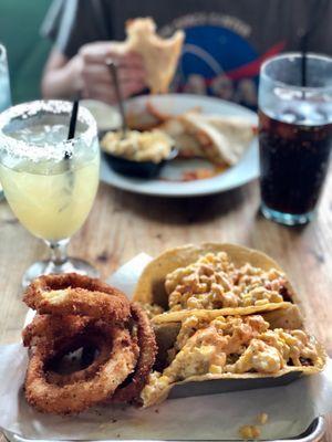 Margarita, blackened shrimp tacos with onion rings, Diet Coke, Buffalo chicken quesadilla