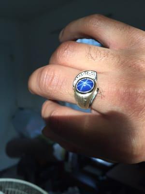 Authentic blue star sapphire. Beautiful work! They also made the ring smaller to give it a snug fit