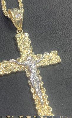 14K gold cross with a 22in rope chain