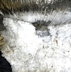 A tunnel created by rats to traverse an attic with ease.