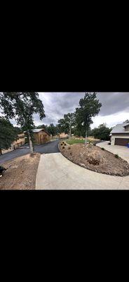 Asphalt covering rock driveway