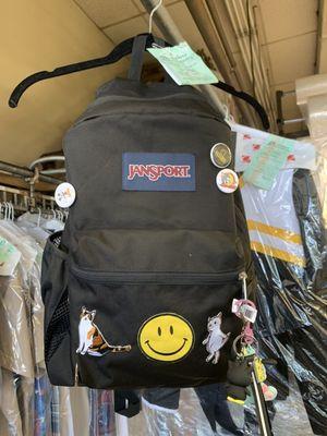 Patches sewn on a backpack