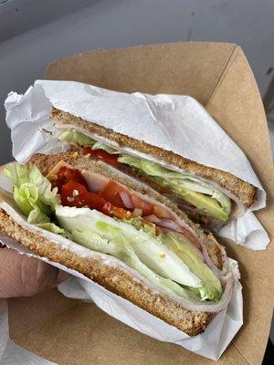 $5.50 for a Turkey sandwich. Avocado, lettuce, mayo, onion, red peppers and tomato.