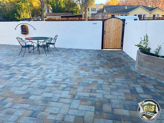 Gate, paver patio and wall