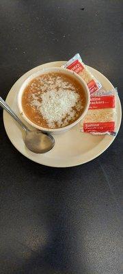 Small cup of Pasta Fagioli soup with crackers and comes with no meat ingredients