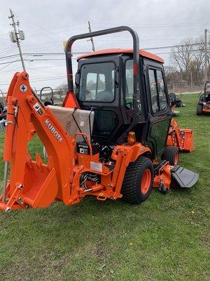 Kubota compact tractor loader backhoe with cab enclosure