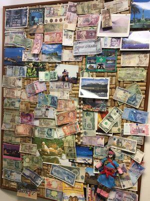 Inside the office. Monies from all over the world.