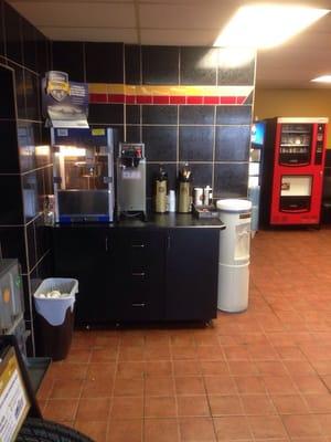 Free popcorn made fresh everyday, free coffee, drink and vending machines while customers wait. Friendly service area.