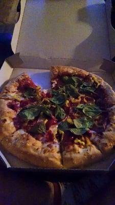 Asiago flavored stuffed crust, creamy garlic parmesan sauce, spinach, salami, bacon, peruvian cherry peppers, banana peppers $11