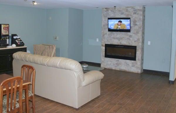 The newly renovated hotel lobby has a comfortable waiting area with Free Wi-Fi, cable TV and a fireplace.