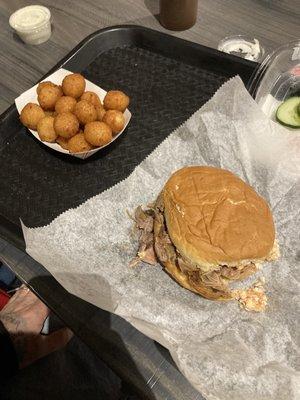 Coarse chopped BBQ sandwich and Hushpuppies. It is some amazing BBQ.