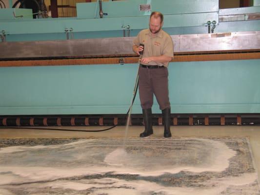 Jeff, our plant manager cleaning the rug.