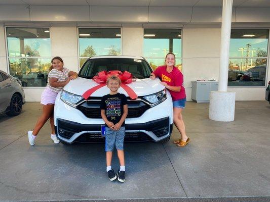 Me and the kids with the new car.