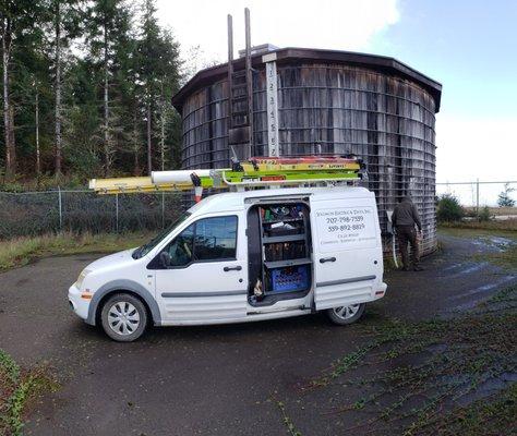 Troubleshooting water tank controls and calibrating sensors.