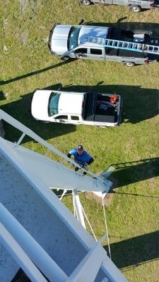 Ty and Doug climbing Mormon mill tower doing upgrades.