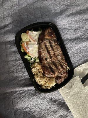 Steak medium rare with the house sauce. Pineapple fried rice and Caesar salad. I recommend this.