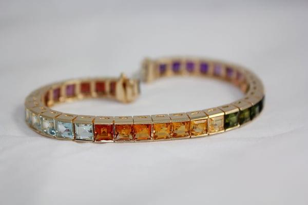 Rainbow toned gemstone tennis bracelet -at Wilson Jewelers