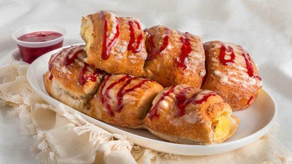 Cheesecake Stromboli with Raspberry Topping