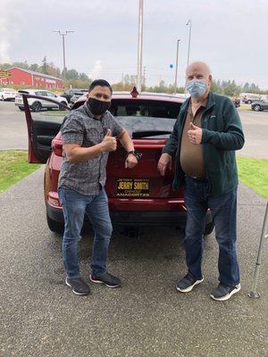 Marvin at Jerry Smith Chevrolet sales department in Anacortes Washington with a happy customer today.