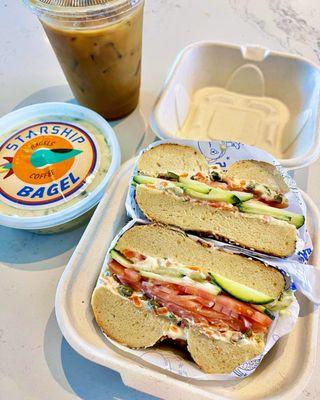 Supernova Lox with garden veggie schmear on everything bagel and an iced latte