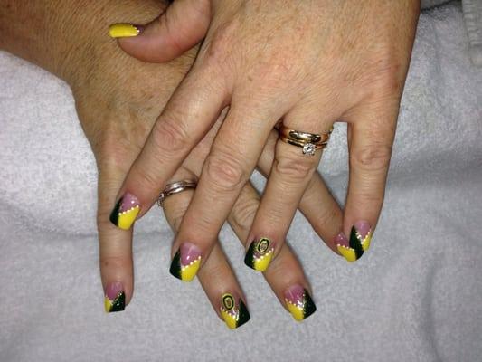 I am a big Oregon Ducks fan. I brought in a picture of this nail design. Tammy did a great job. Love it!