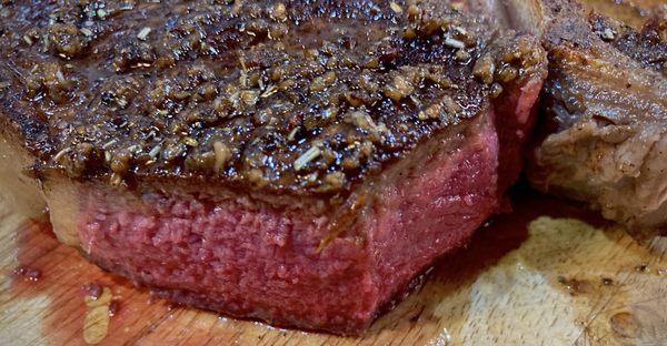 Porterhouse steak, salted as it warmed up for 45 minutes, sautéed in oil.