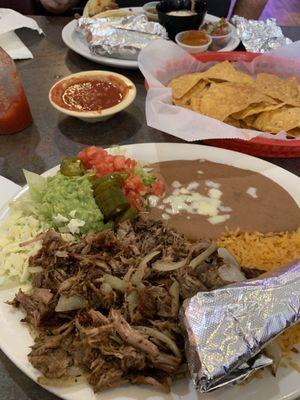 Carnitas  Very lean and flavorful. The beans are a bit bland . The jalapeño is great  Will order this again