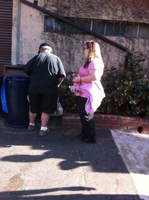 pizza girl and dad digging for cans during wrestling