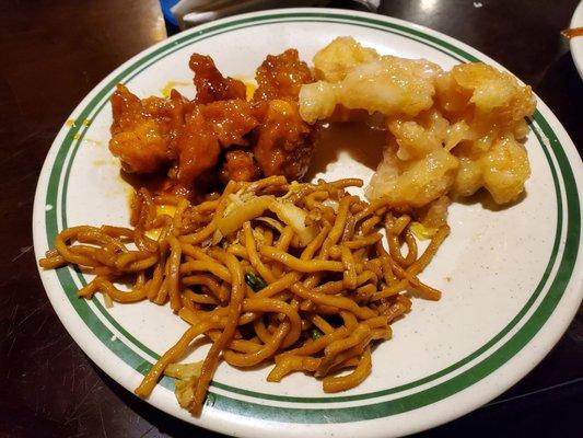 Lo mein bottom, orange chicken on the left, coconut shrimp on the right