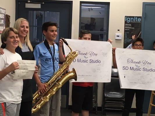 Giving free instruments to a middle school