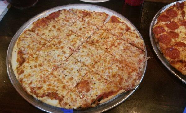 Village Pizza in Carpentersville Route 25 location. Large thin crust cheese pizza.