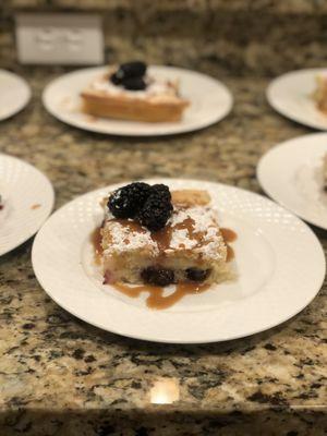 Ooey gooey butter cake with blackberries and salted bourbon caramel sauce