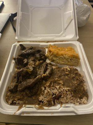 Pepper Steak , Rice and Peas, and Macaroni and Cheese