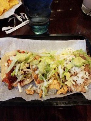 Carne asada, pollo, and fried pork tacos