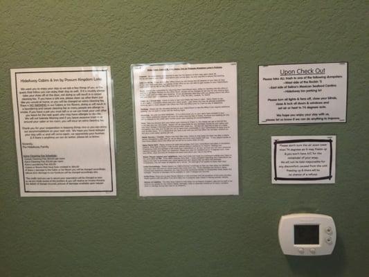 Notes, rules and threats posted in room.