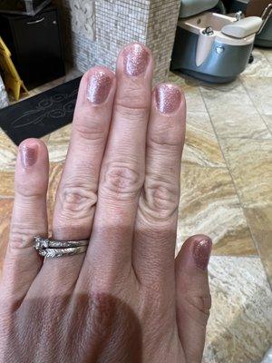 Gel manicure, glitter all over my fingers, nails way too short and look terrible. We were charged 45 for just this manicure.