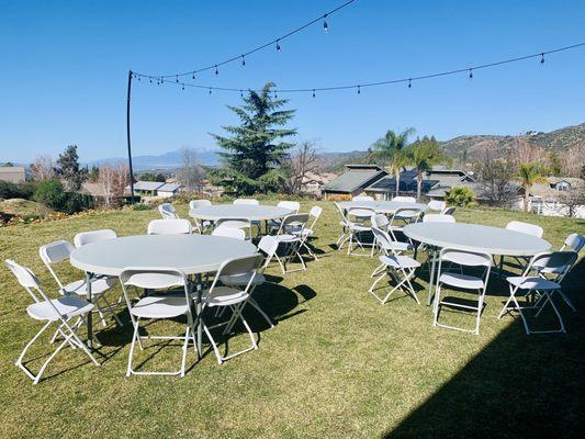 60" round tables & white plastic folding chairs