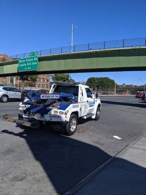 Universe Towing truck is leaving us on the side of the road because we refused to take our car to his body shop!