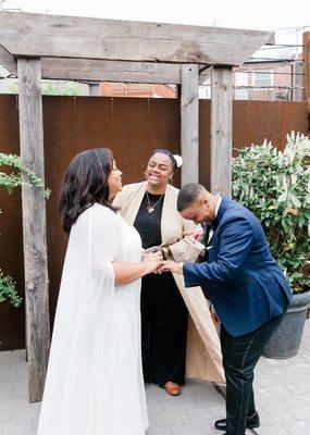 A happy couple at the altar with LaToya