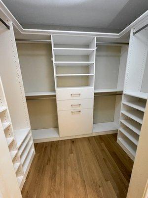 Custom walk in master closet shelving