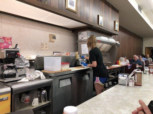 Hard at work cooking our food.