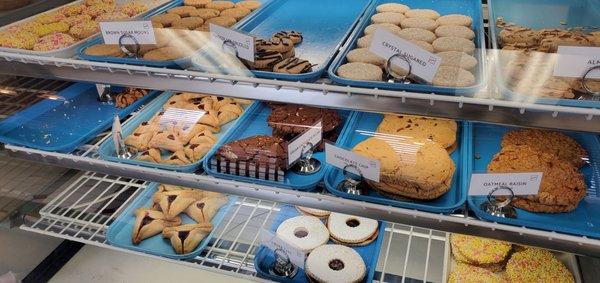 Display case of pastries and baked goods