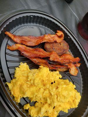 From the waffle house food truck. Scrambled egg with cheese, bacon and sausage