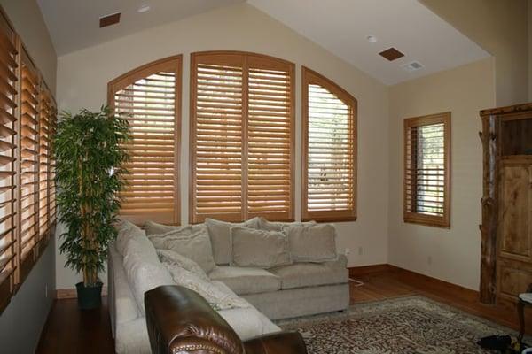 Arched wood shutters in a Flagstaff home.