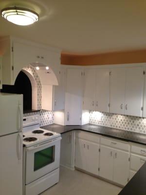 Kitchen remodel with arch in wall located in Portland, Oregon