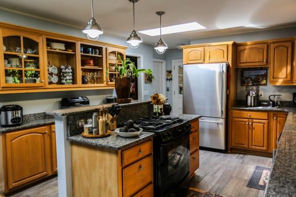 Piedmont Dr. Renovation - New counters transformed the kitchen! We also replaced the wood flooring.