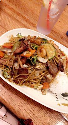 Yakisoba combo with chicken, beef, and shrimp. It's a must try! So good!